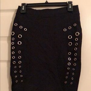 Black mini skirt with silver cutouts